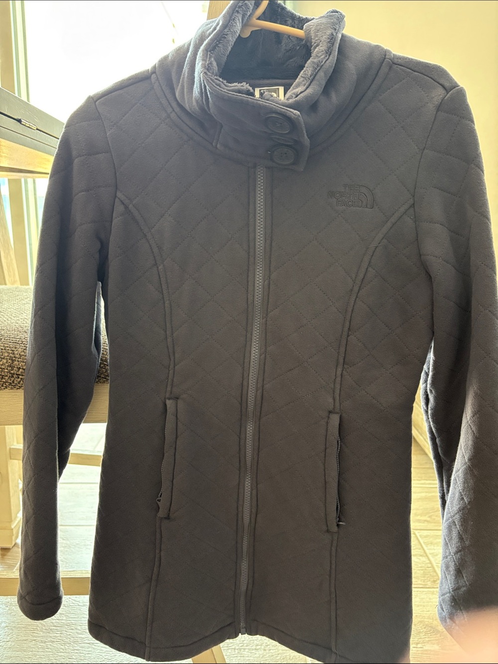 The North Face Women's Quilted Puffer Jacket in blue
